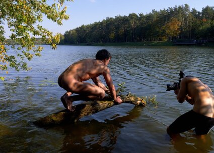 Nude male nature photoshoot with kinky gay ass tattoo