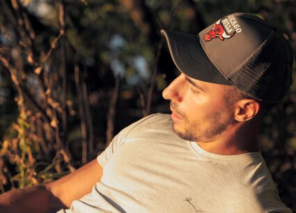 Cyclist jerking in public place meeting the beautiful sunset