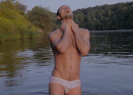 Sexy man bathing in gay white underwear