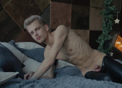 Seductive twink stripping and playing with uncut cock