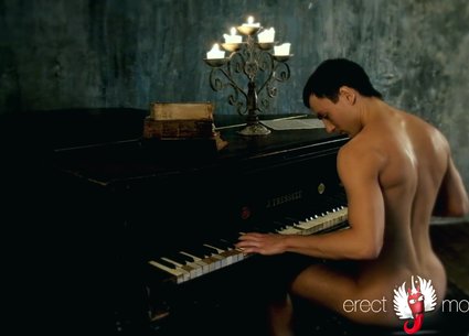 Pianist is undressing and showing his naked body on the piano